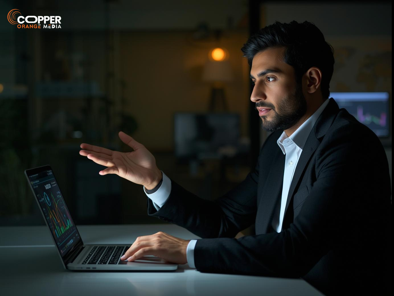 Digital marketer in Pakistan presenting SEO and PPC strategy with analytics and dashboards.